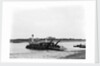 The steam chain ferry 'Lady Quilter' (1894) on the Felixstowe side of the River Deben, with Bawdsey Manor in the background by Smiths Suitall Ltd.