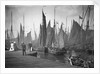 A view from the wooden quay at Lowestoft, Suffolk, looking across the trawl basin filled with a large number of sailing trawlers by Smiths Suitall Ltd.