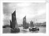 The trawler 'LT372' under sail with 'LT205' in tow of the paddle tug 'Imperial' (1879) leaving the harbour at Lowestoft, Suffolk by Smiths Suitall Ltd.