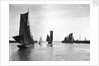 The trawler 'Roma' (1906) [LT410] with an unidentified trawler sailing out of the outer harbour at Lowestoft, Suffolk by Smiths Suitall Ltd.
