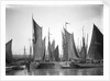 A view across Lowestoft harbour to the entrance of the trawl basin in the morning by Smiths Suitall Ltd.