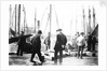 Unloading the catch in Lowestoft Harbour, with the South Pier Pavilion in the background by Smiths Suitall Ltd.