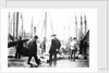 Unloading the catch in Lowestoft Harbour, with the South Pier Pavilion in the background by Smiths Suitall Ltd.