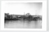 A view of the river frontage of the Harris boatyard taken from the Wivenhoe side of the River Colne by Smiths Suitall Ltd.