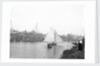 A view of the quay at Rowhedge during an unidentified festival, taken from the Wivenhoe side of the River Colne by Smiths Suitall Ltd.