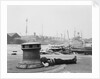 Man resting at Surrey Commercial Docks by unknown
