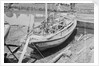 A Twaqo type junk dried out on shore at Singapore by David Watkin Waters