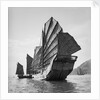 A port quarter view of the Yeungkong fisher type junk with the port number 227HA under sail at Aberdeen, Hong Kong. by David Watkin Waters