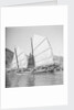 An Aberdeen fisher type junk under sail in Hong Kong harbour. by David Watkin Waters
