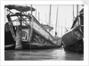 A starboard quarter view of an Hangchow Bay trader type junk moored with other junks at Shanghai by David Watkin Waters