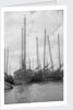A bow view of the lorcha type junk 0667 moored between other junks at Shanghai by David Watkin Waters
