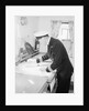 A ship's officer at the chart table of passenger liner 'Kenya' (1951) by unknown