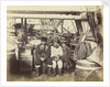 At Proven, Hans Henri, Esquimaux Dog-Driver, with his son and daughter by Thomas Mitchell