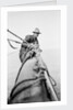 Seaman and photographer Alan Villiers on a yard with camera by unknown
