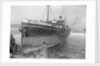 The cargo ship Archangelos (1918) with tugs in the background by Gibson & Sons of Scilly