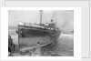 The cargo ship Archangelos (1918) with tugs in the background by Gibson & Sons of Scilly