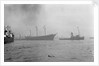 The clipper ship 'Cutty Sark' (1869) being towed from the East India Dock to Greenwich by the tug 'Gondia' (1927) by unknown