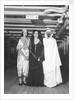Passengers dress up in Middle Eastern costume for an obscure tableau aboard an unspecified cruise ship by Marine Photo Service
