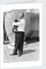 Steward with ship's cat by Marine Photo Service