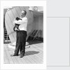 Steward with ship's cat by Marine Photo Service