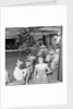 Three children in the "Apple Eating" contest, possibly in the ballroom of the 'Chusan' (1950) by Marine Photo Service