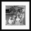 Three children in the "Apple Eating" contest, possibly in the ballroom of the 'Chusan' (1950) by Marine Photo Service