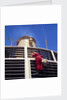 Father Christmas, or Santa Claus, climbing the grill in front of the forward funnel above the bridge on 'Oriana' (1960) by Marine Photo Service