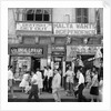 A view of shops with anti-British and pro-Independence signs, possibly on Kings Street, Valetta, Malta. by Marine Photo Service