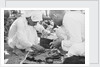 Pearl buyers examining pearls by Alan Villiers