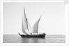 A boom in calm waters off the South Arabian or Omani coast by Alan Villiers