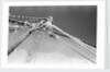Man up aloft on the 'Sheikh Mansur' by Alan Villiers