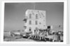 Three-storey building and boatyard, Jizan by Alan Villiers