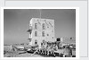 Three-storey building and boatyard, Jizan by Alan Villiers