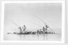 Imported ship-building timbers were poled from dhow to boatyard by Alan Villiers
