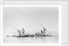Imported ship-building timbers were poled from dhow to boatyard by Alan Villiers
