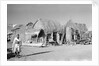Jizan market with 'ushshah' houses by Alan Villiers