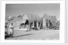 Jizan market with 'ushshah' houses by Alan Villiers