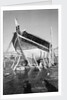 A zarook undertaking repairs on Ma'alla beach by Alan Villiers