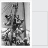 Sailors climbing the halyard blocks by Alan Villiers