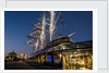 Cutty Sark port side views of the ship at sunset with Christmas tree decoration by National Maritime Museum