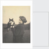 An informal photograph of Kathleen Alice Taylor holding Slabbie the black/white cat in her hands by Unknown