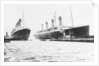 Passenger liner 'Titanic' (Br, 1912) Oceanic Steam Nav Co Ltd, (Ismay Imrie & Co Ltd, managers) (White Star Line): at Belfast with 'Olympic', tip of foremast out of picture by unknown