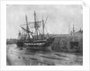 Stern quater view of copper ship and others aground at low tide by unknown