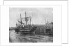 Stern quater view of copper ship and others aground at low tide by unknown