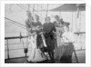 Group portrait including Mr Hill of the Seamen's Institution on deck, at Iquique, Chile by unknown
