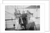 Group portrait including Mr Hill of the Seamen's Institution on deck, at Iquique, Chile by unknown