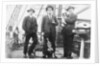 Second Officer, Captain H.J. Bray (with dog Ollie) and Chief Officer standing on deck, at Tacoma, USA by unknown