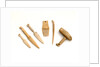 Ivory model of a snow knife, awl, comb by unknown
