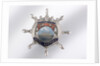Enamelled metal brooch by unknown