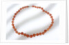 Amber beads by unknown